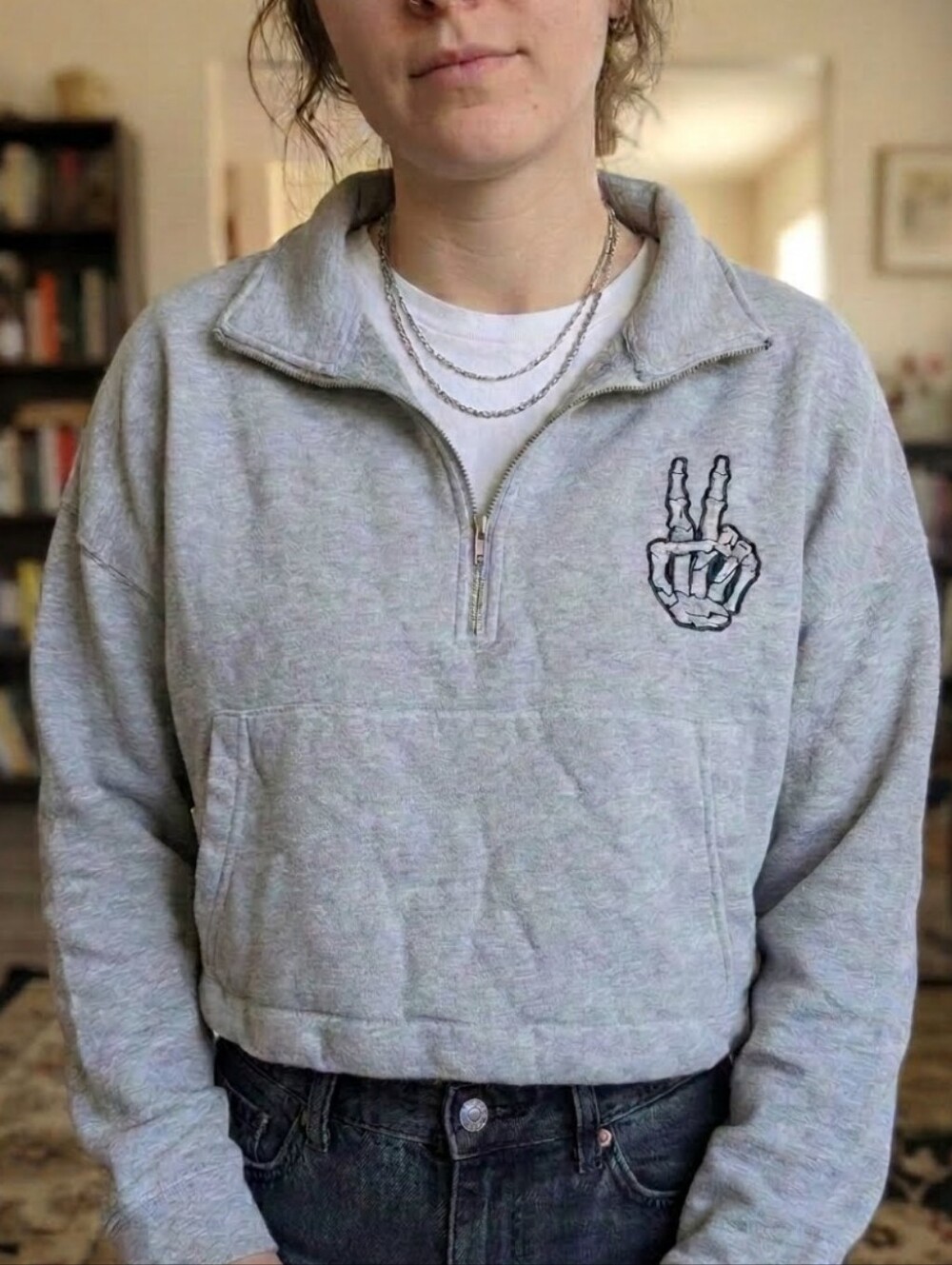 Cropped Gray Half-Zip Pullover Sweatshirt with Skeleton Peace Hand